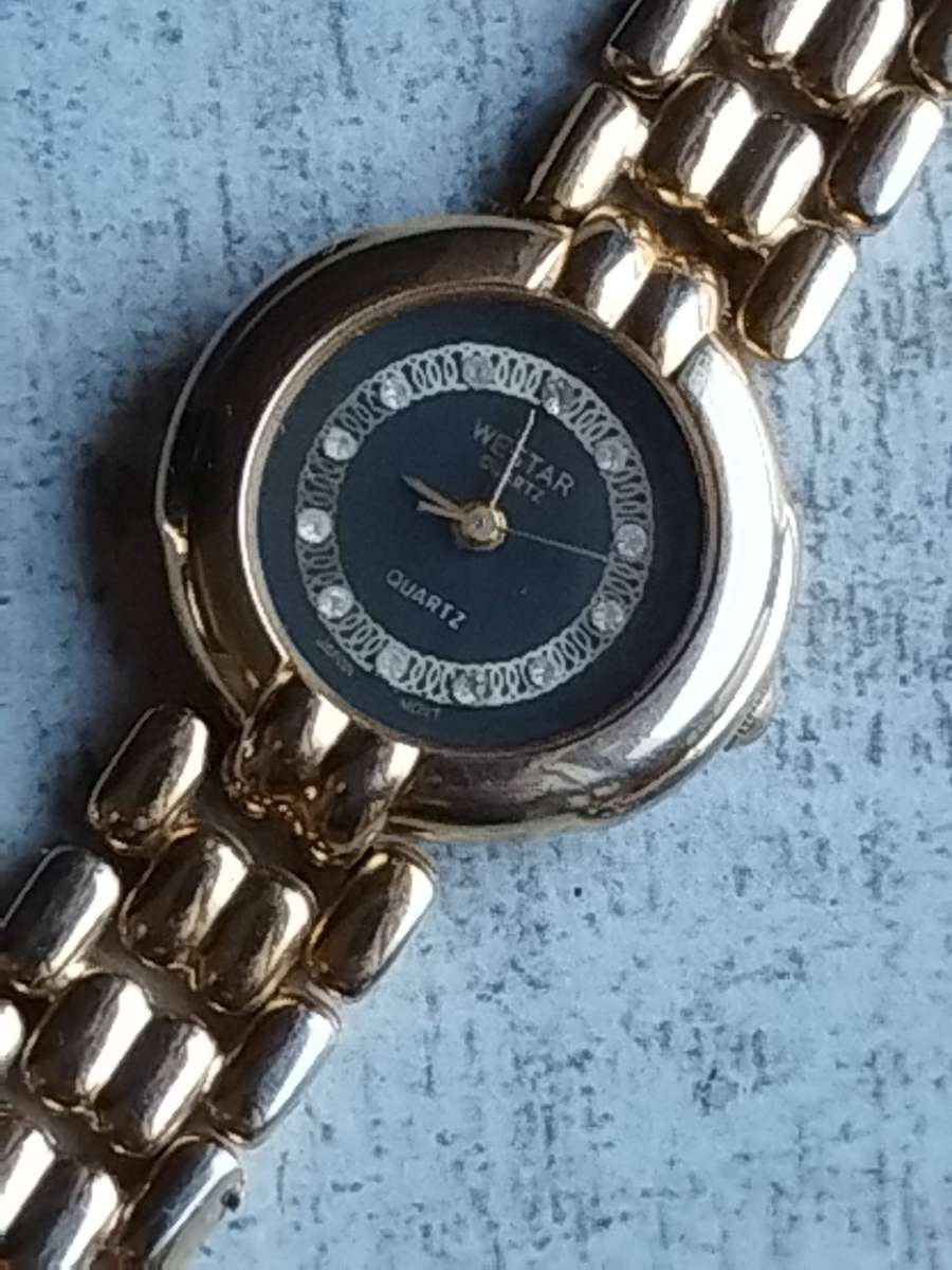 LADIES WESTAR GOLD WATCH IN EXCELLENT WORKING CONDITION