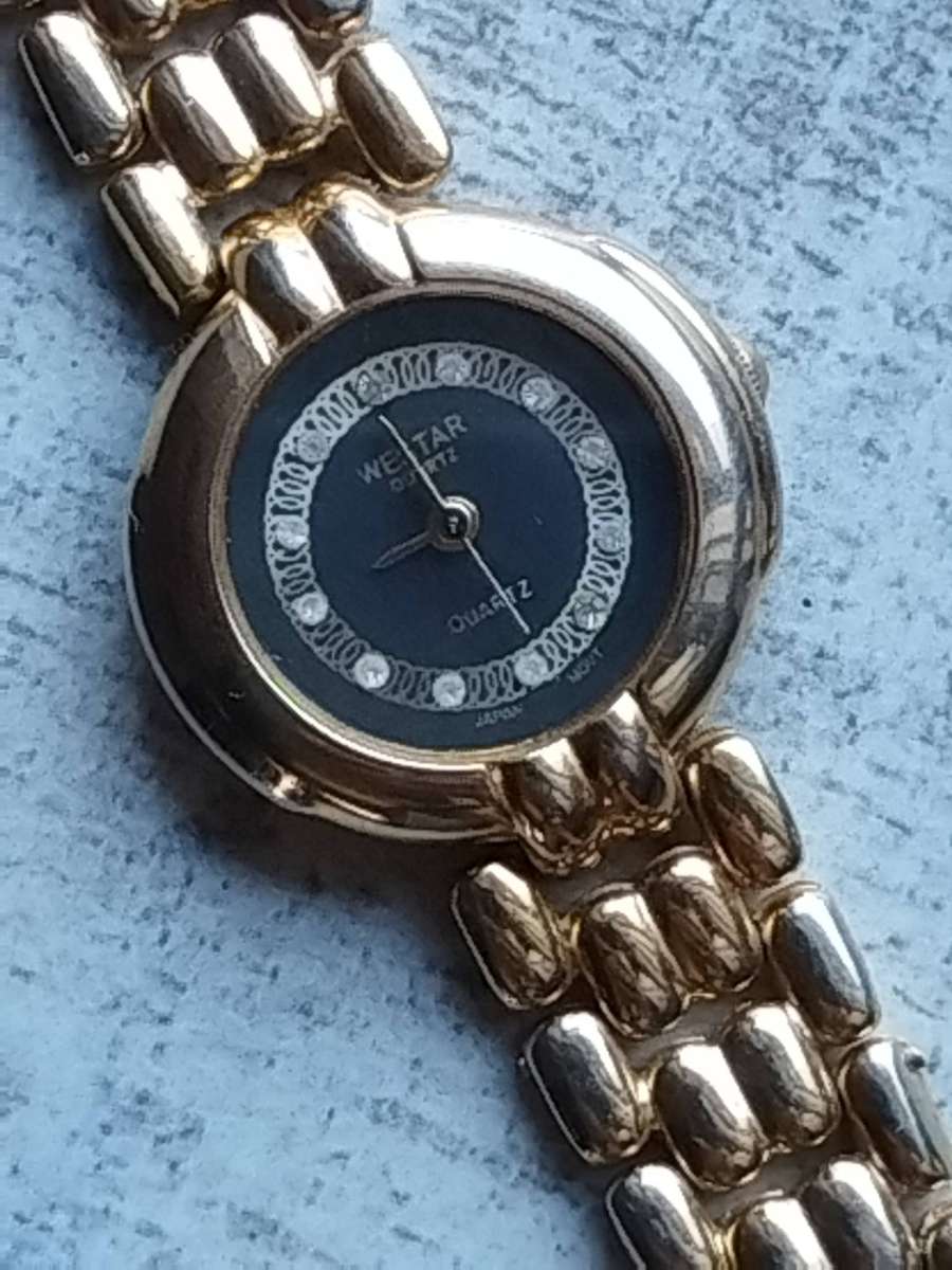 LADIES WESTAR GOLD WATCH IN EXCELLENT WORKING CONDITION