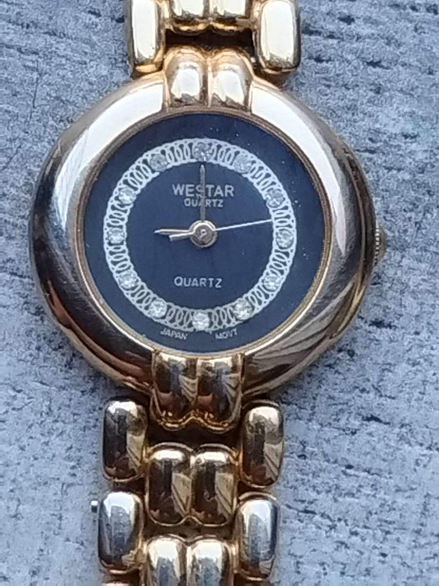 LADIES WESTAR GOLD WATCH IN EXCELLENT WORKING CONDITION