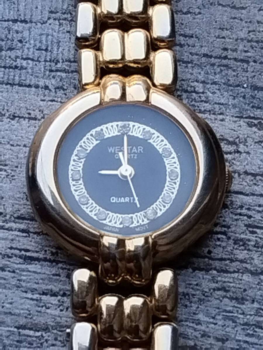 LADIES WESTAR GOLD WATCH IN EXCELLENT WORKING CONDITION