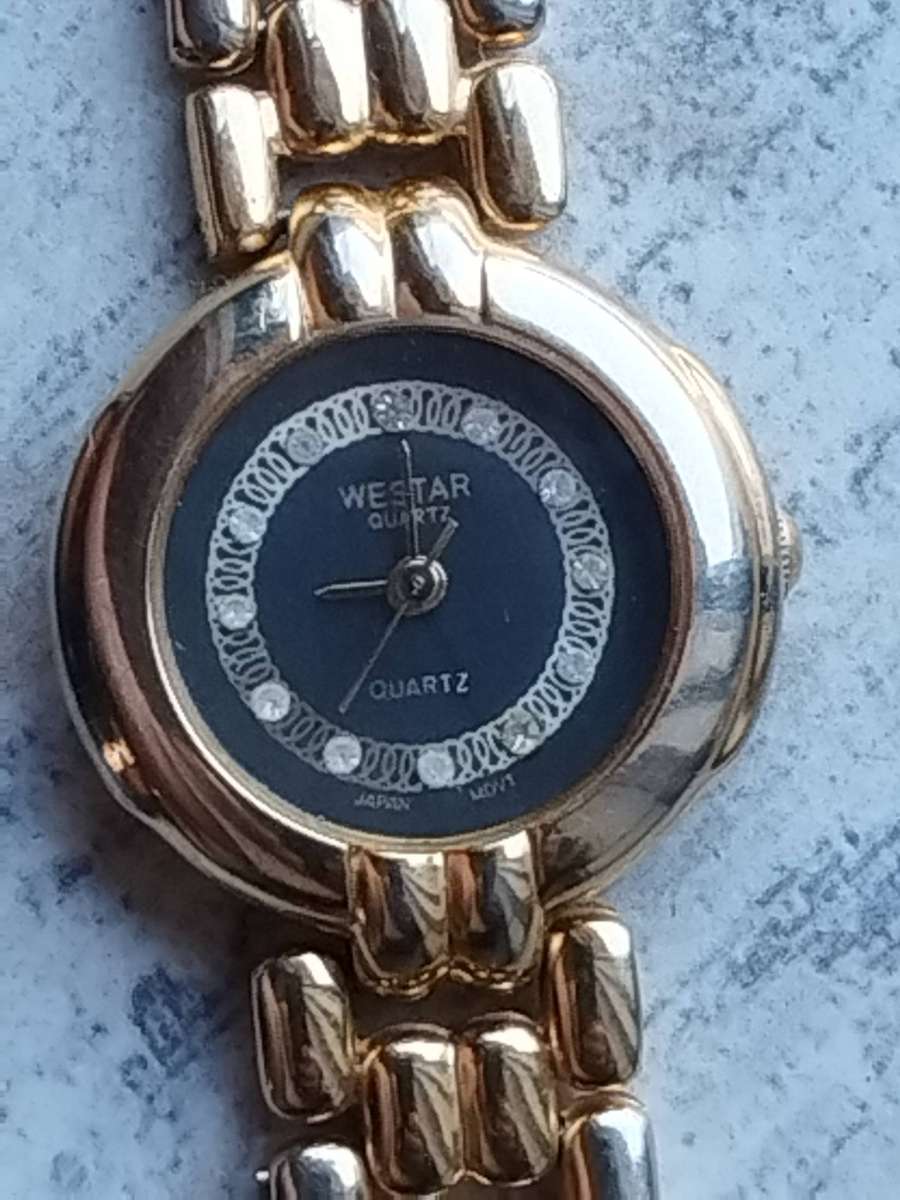 LADIES WESTAR GOLD WATCH IN EXCELLENT WORKING CONDITION
