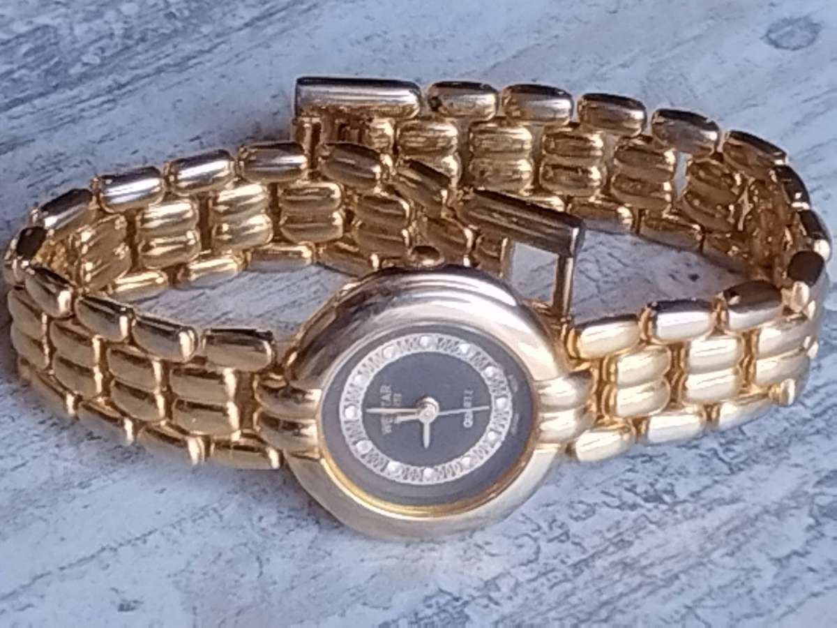 LADIES WESTAR GOLD WATCH IN EXCELLENT WORKING CONDITION