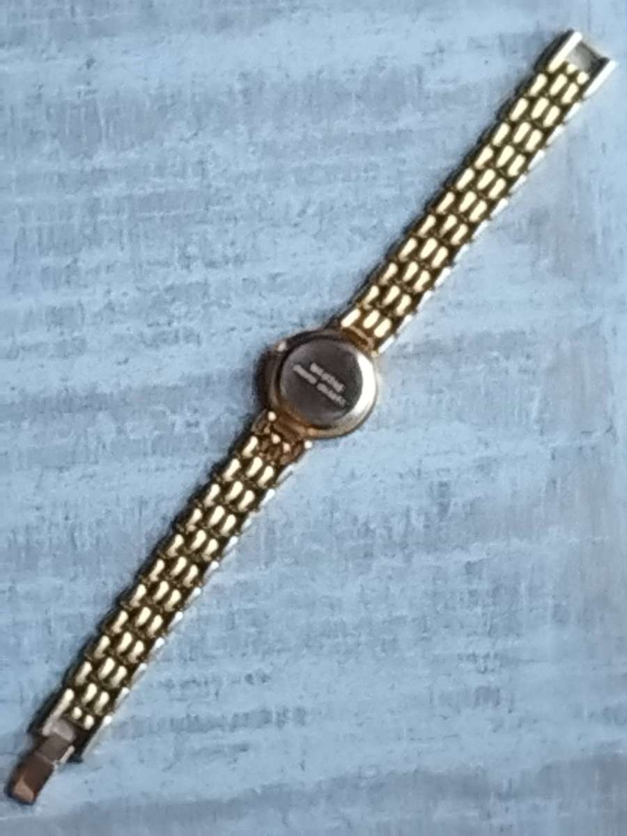 LADIES WESTAR GOLD WATCH IN EXCELLENT WORKING CONDITION