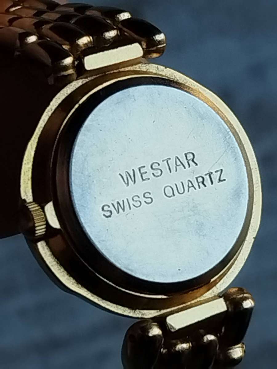 LADIES WESTAR GOLD WATCH IN EXCELLENT WORKING CONDITION