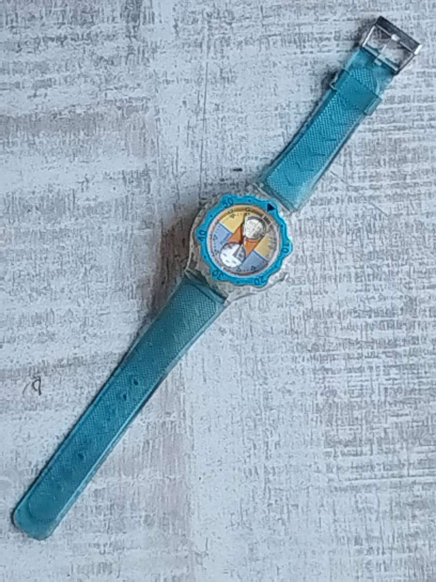 MENS FLASH SPORTS WATCH WITH ROTATING BEZEL AND SEE-THROUGH BACK IN EXCELLENT WORKING CONDITION