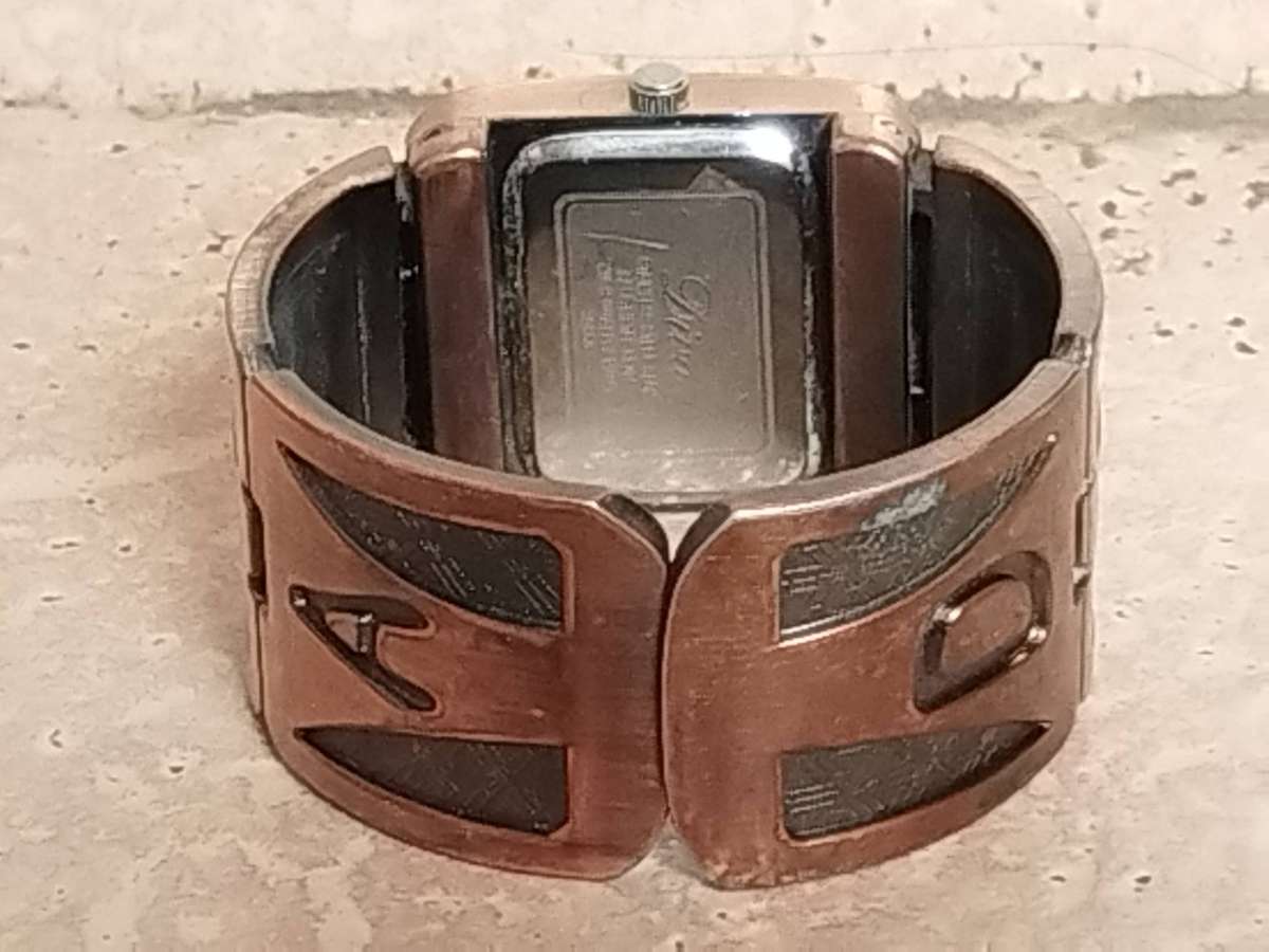 LADIES DIVA BRONZE BANGLE WATCH IN EXCELLENT WORKING CONDITION