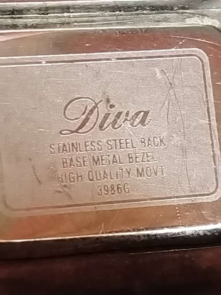 LADIES DIVA BRONZE BANGLE WATCH IN EXCELLENT WORKING CONDITION