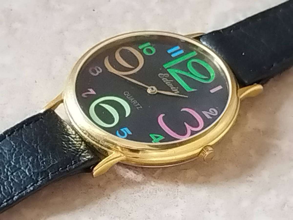 LADIES GOLD EDWIN COLOURFUL WATCH IN EXCELLENT WORKING CONDITION