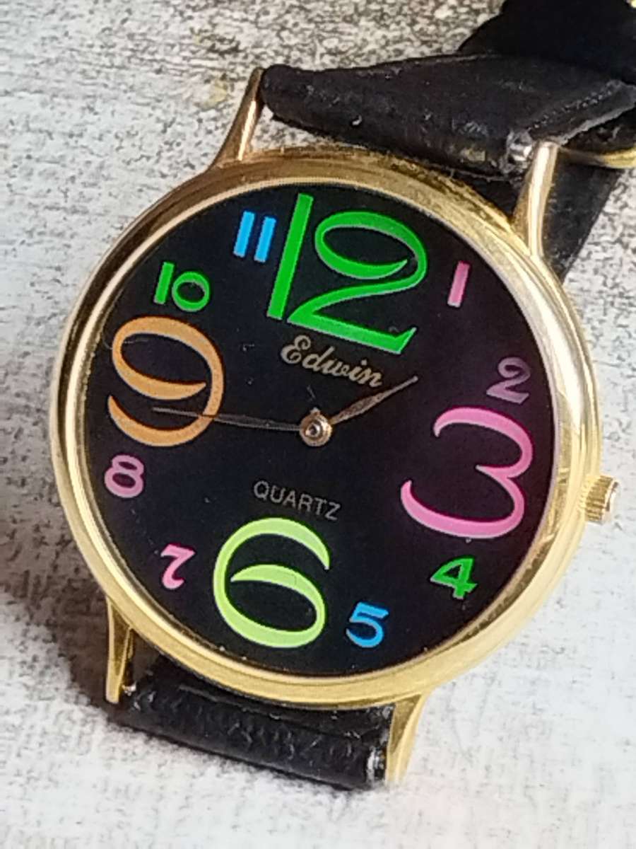 LADIES GOLD EDWIN COLOURFUL WATCH IN EXCELLENT WORKING CONDITION