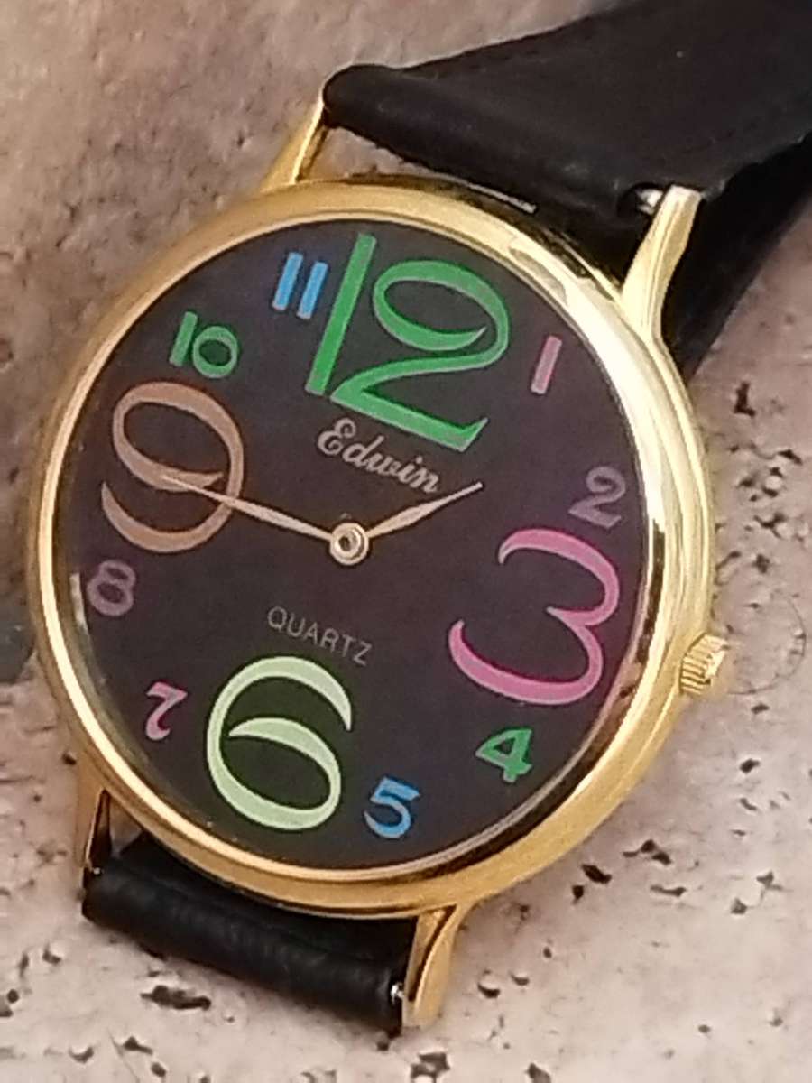 LADIES GOLD EDWIN COLOURFUL WATCH IN EXCELLENT WORKING CONDITION