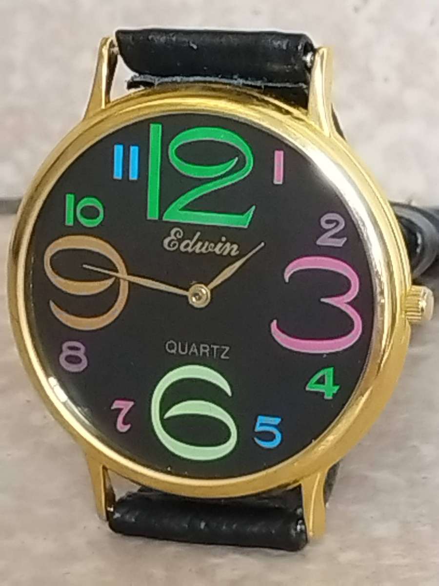 LADIES GOLD EDWIN COLOURFUL WATCH IN EXCELLENT WORKING CONDITION
