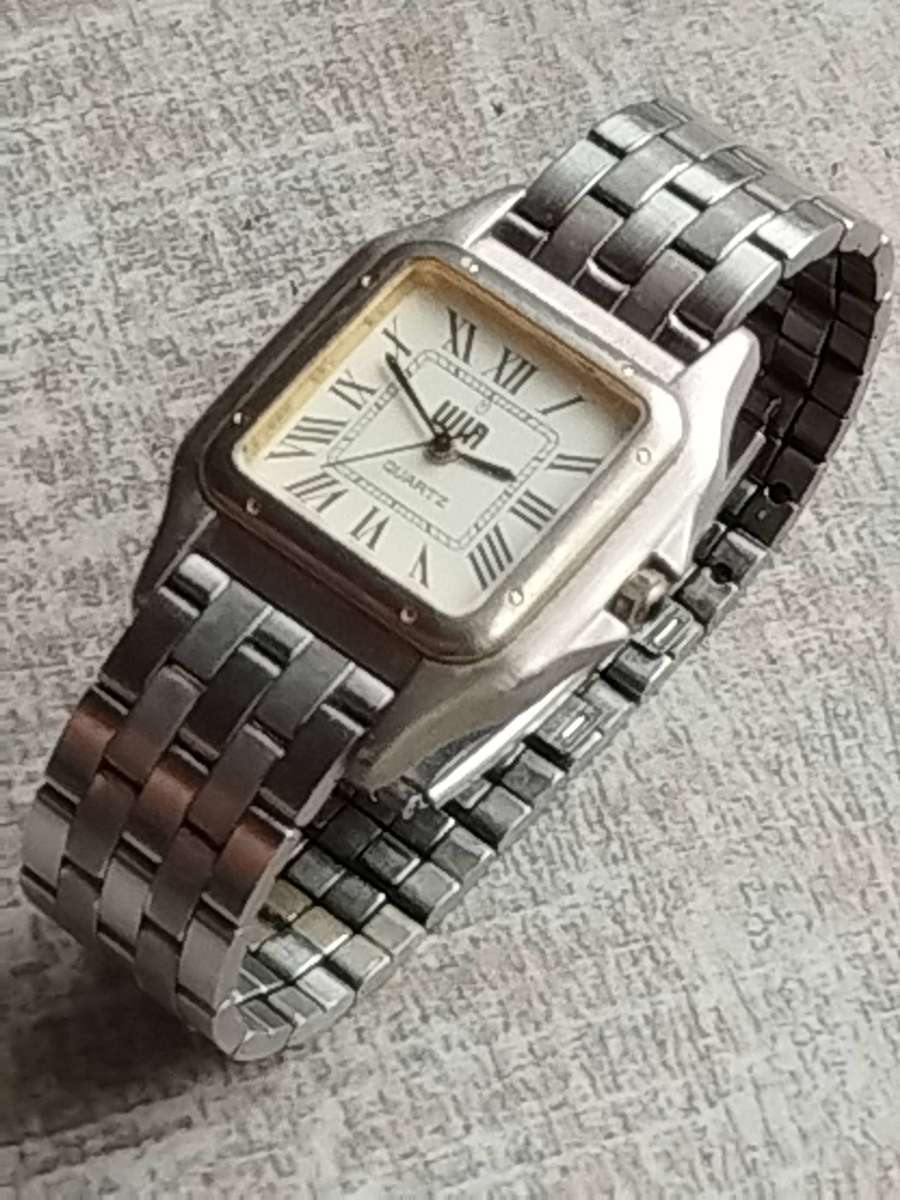 LADIES VINTAGE WIN ALL STAINLESS STEEL WATCH IN EXCELLENT WORKING CONDITION