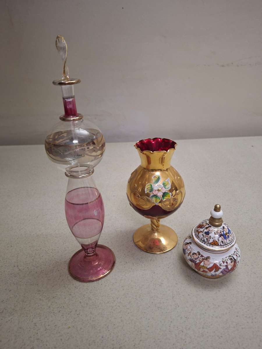 Two perfume bottles one glass venation vase