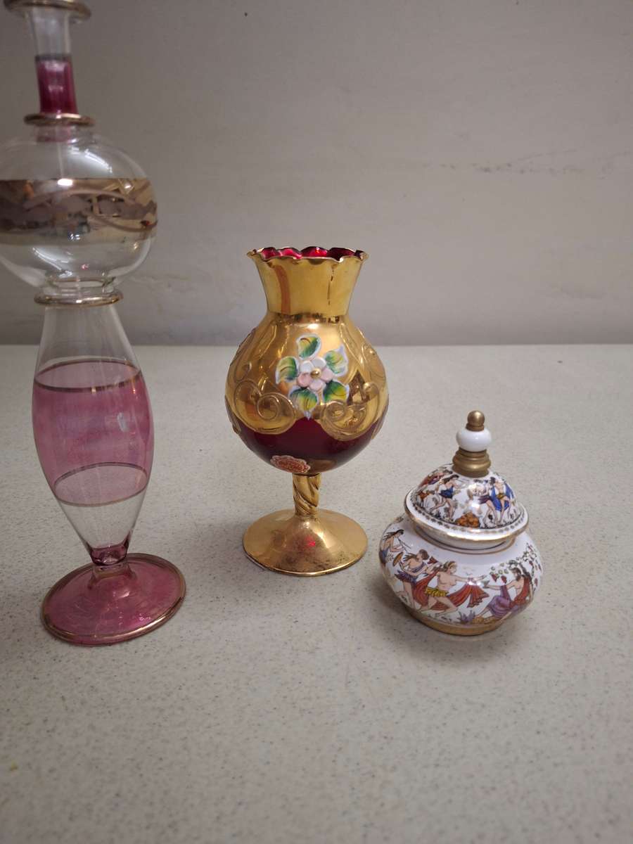 Two perfume bottles one glass venation vase