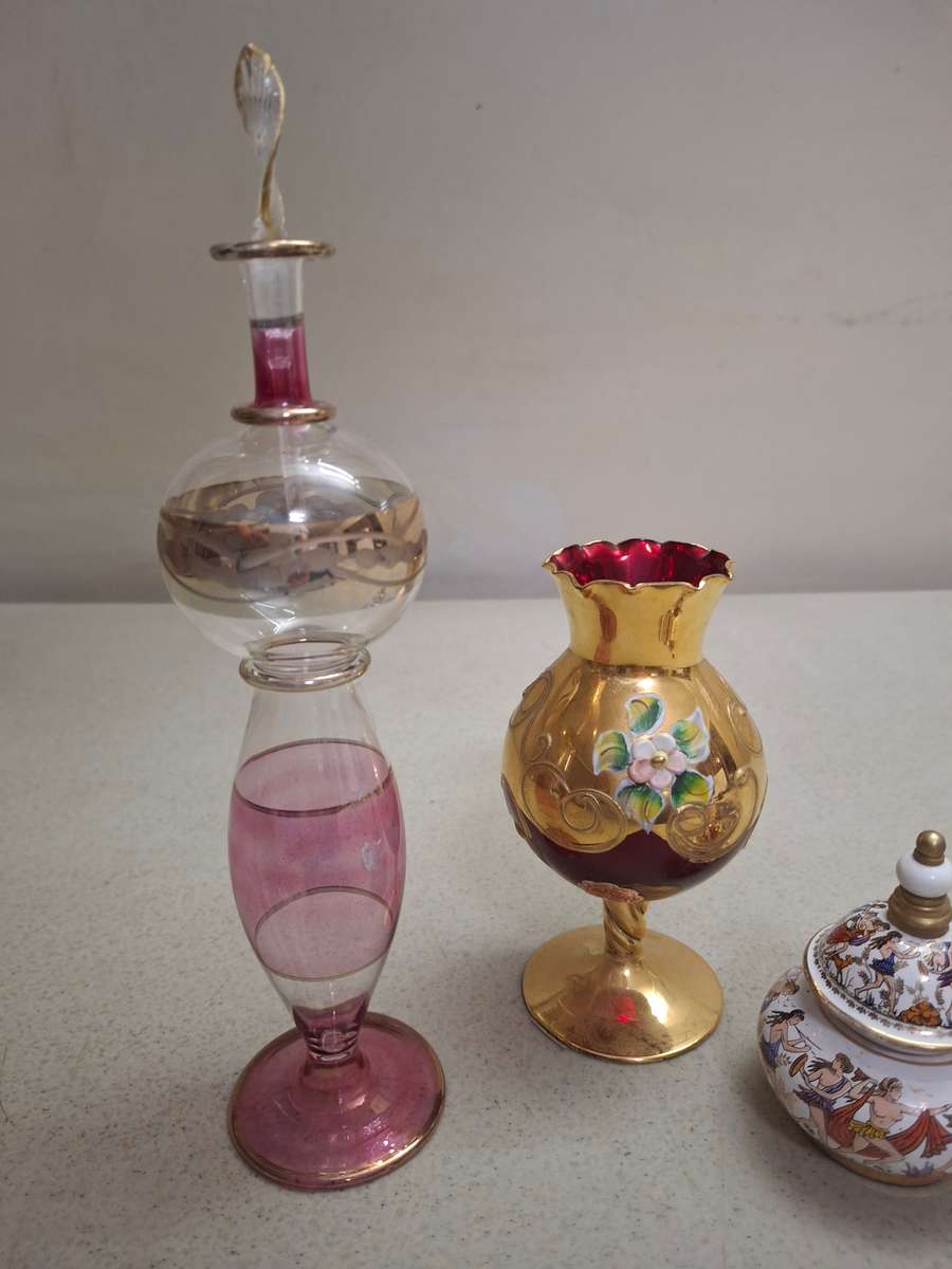Two perfume bottles one glass venation vase