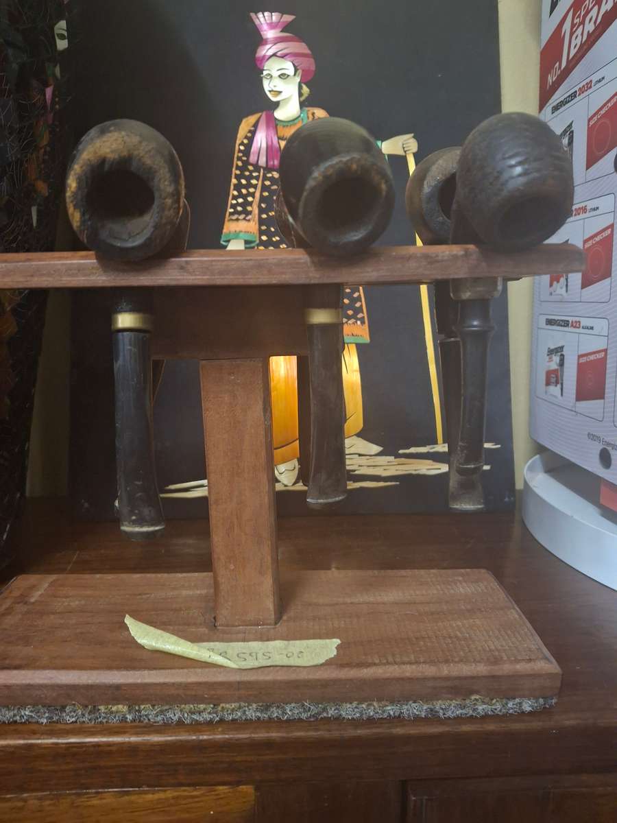 Wooden pipes on stand