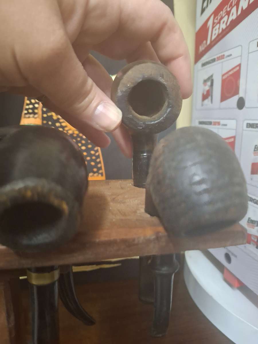 Wooden pipes on stand