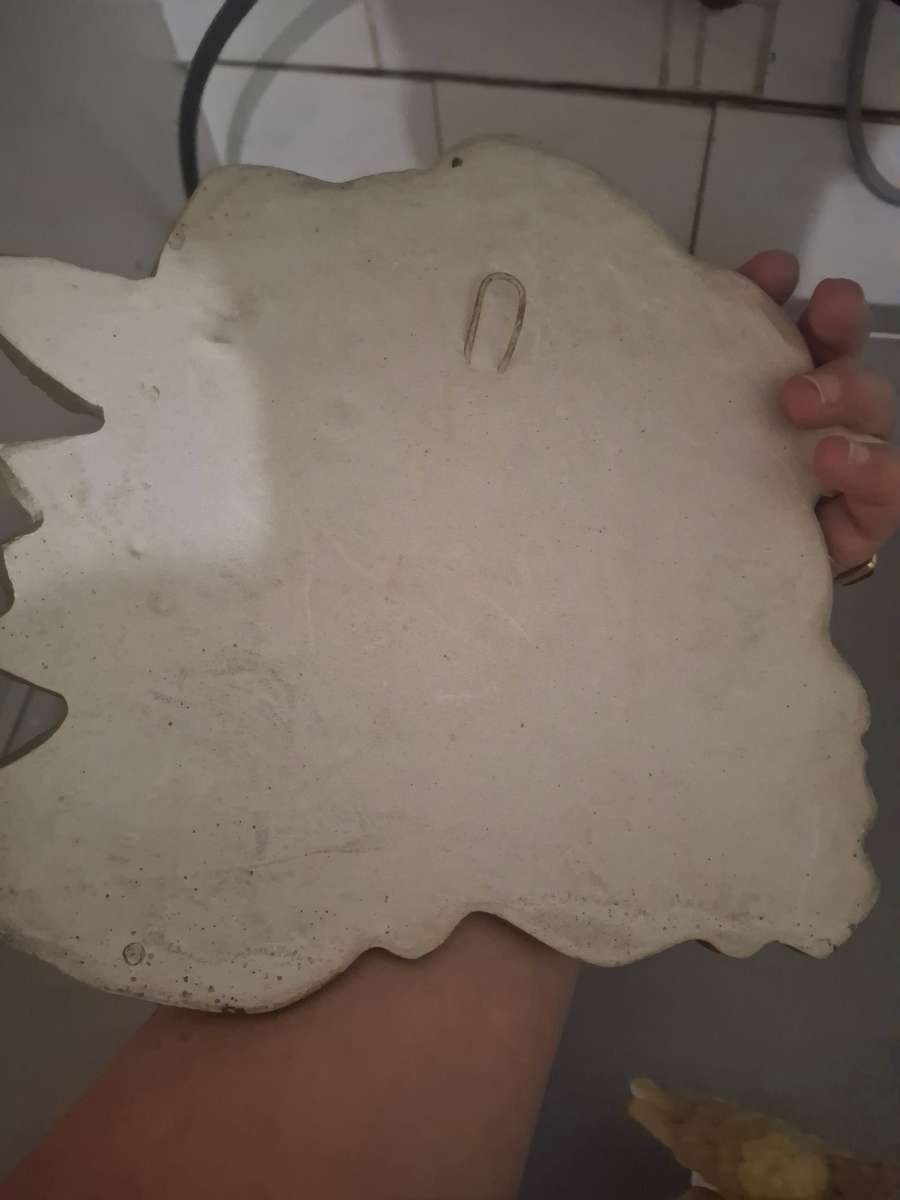 Plaster of paris cherub wall mount