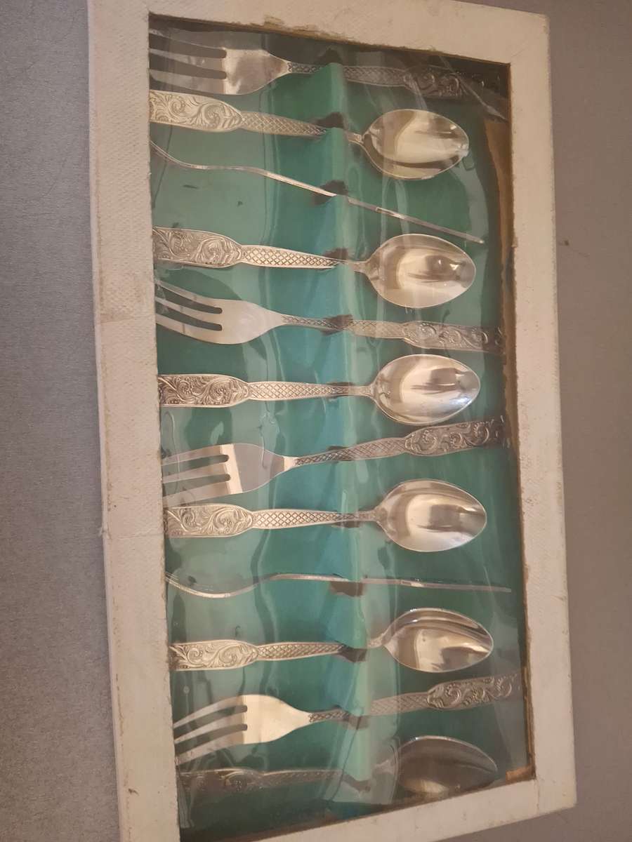Boxed vintage stainless steel tea spoons and cake forks