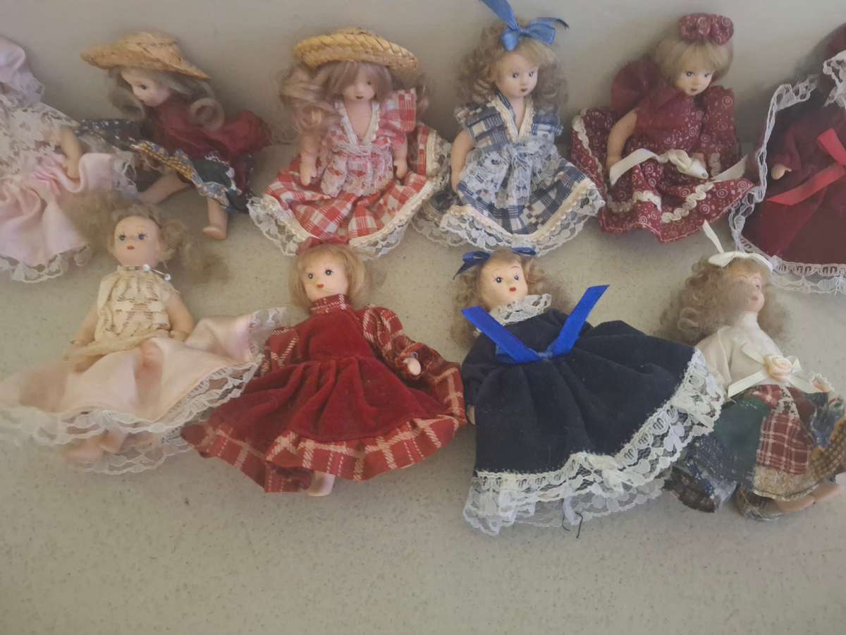 Collection of small procelain dolls