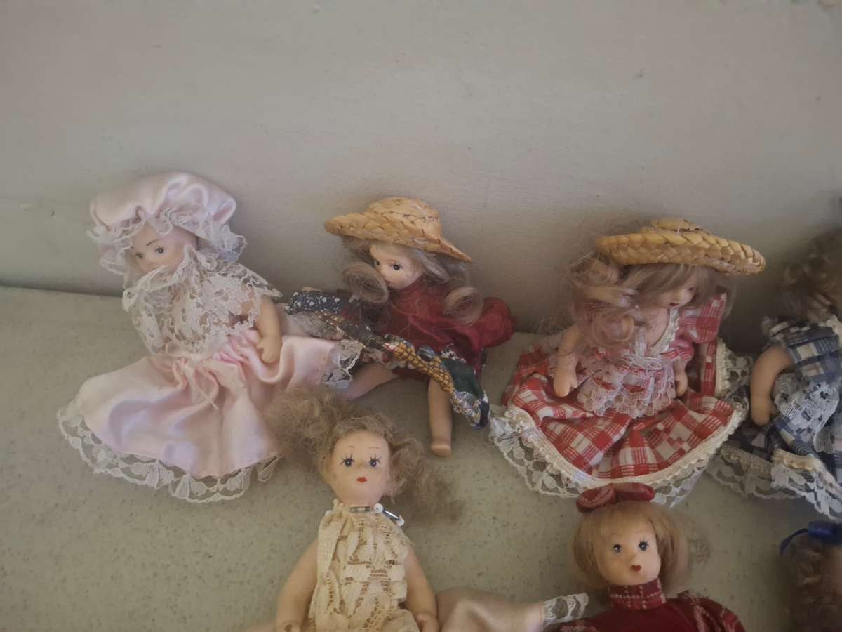 Collection of small procelain dolls