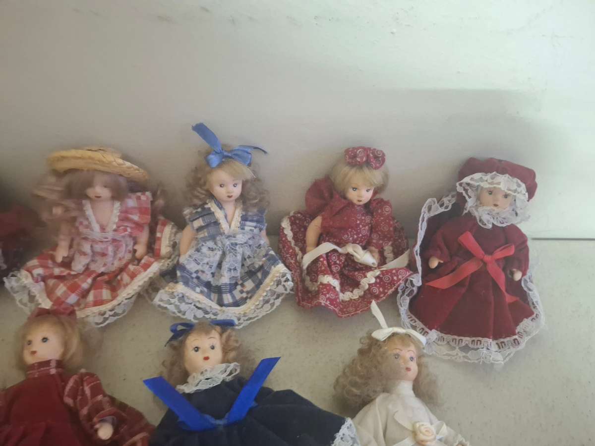Collection of small procelain dolls