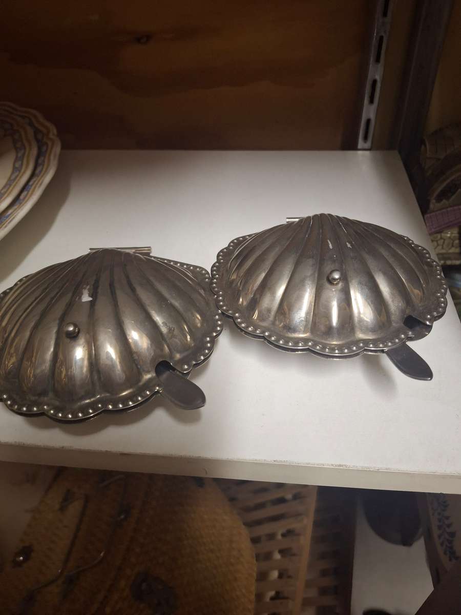 Two chrome plated butter dishes