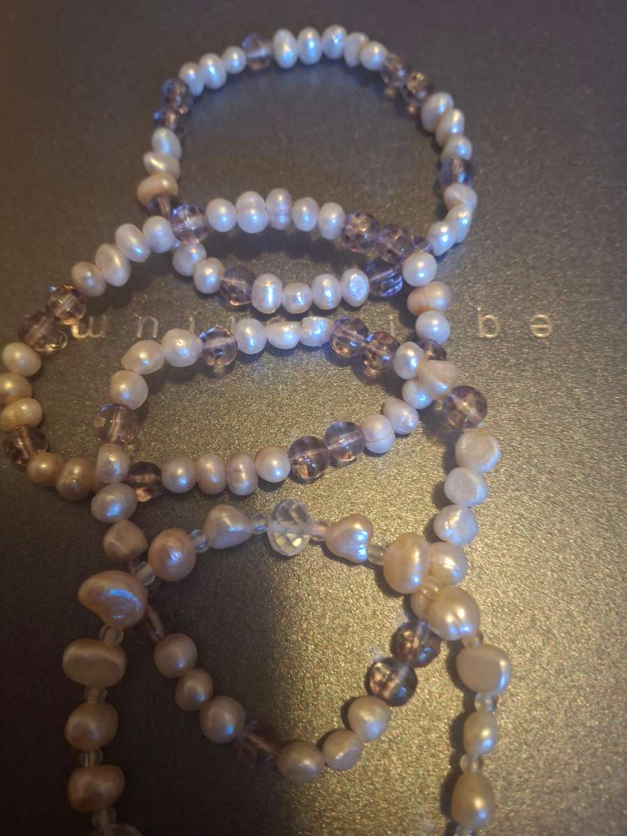 Three pearl bangles