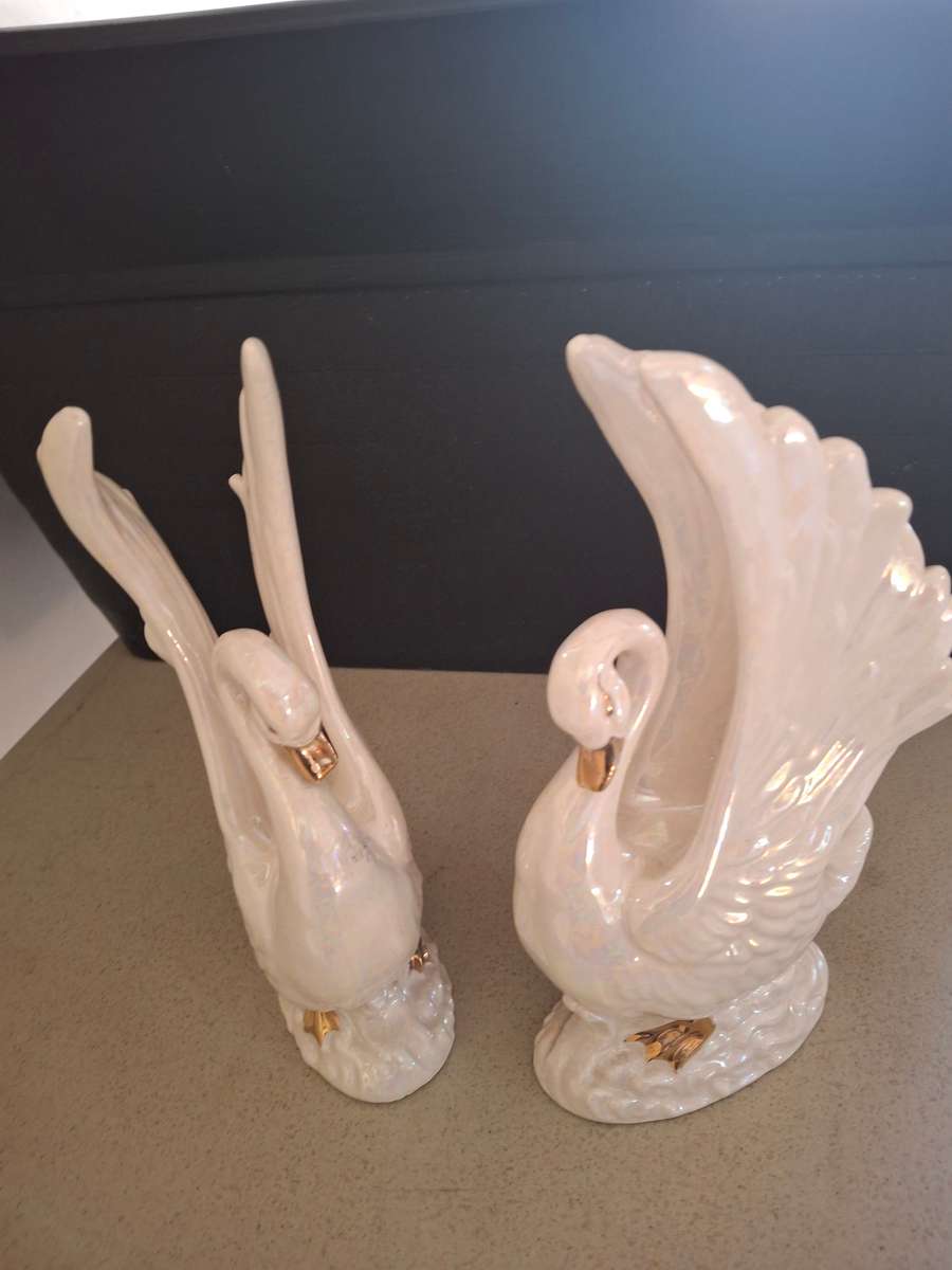 Pair of luster style procelain swans