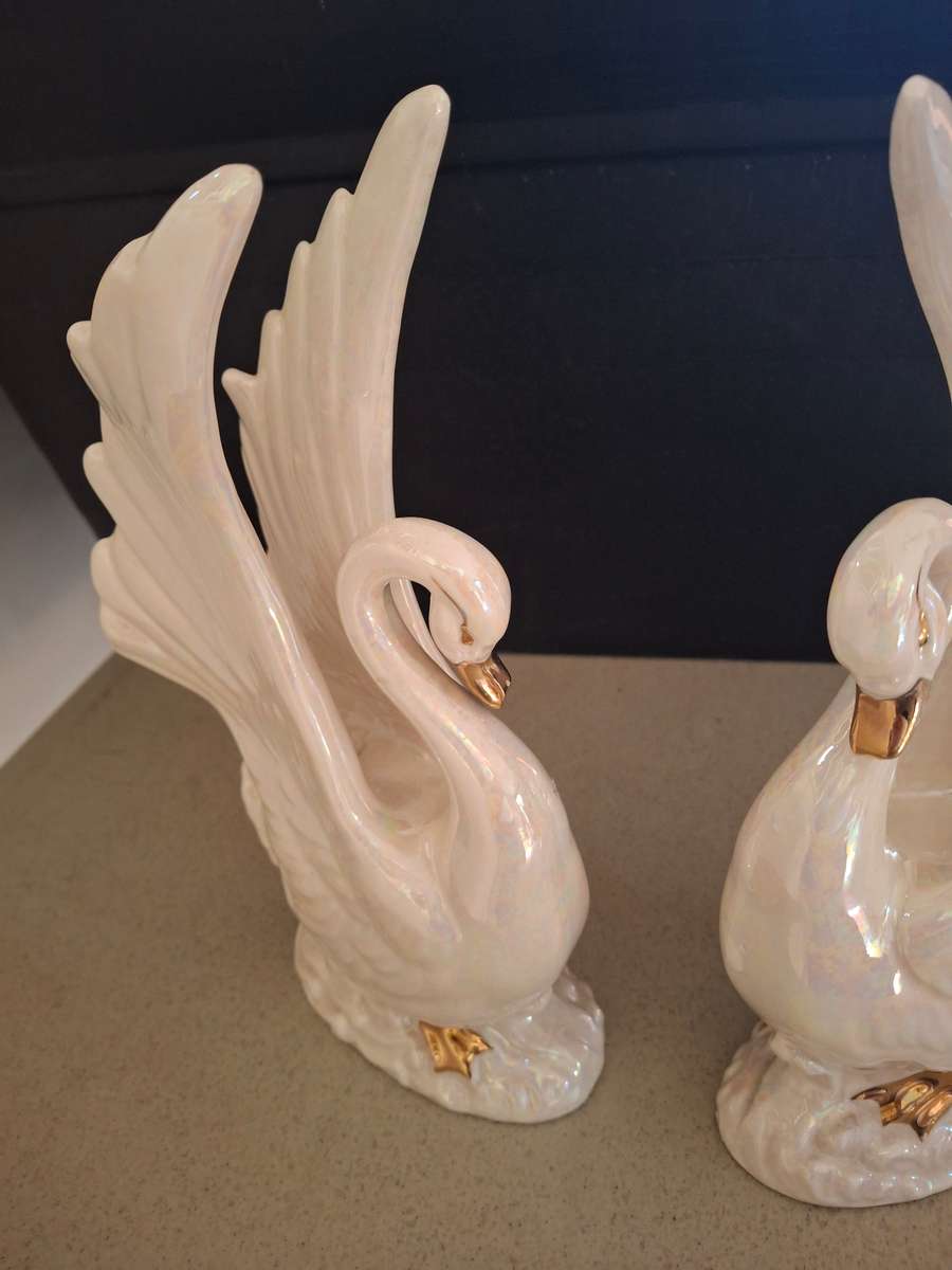 Pair of luster style procelain swans