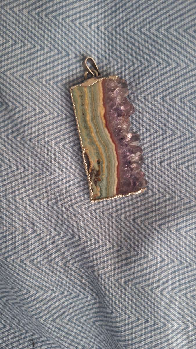 Stunning amyethest and floiright gem stone pendant