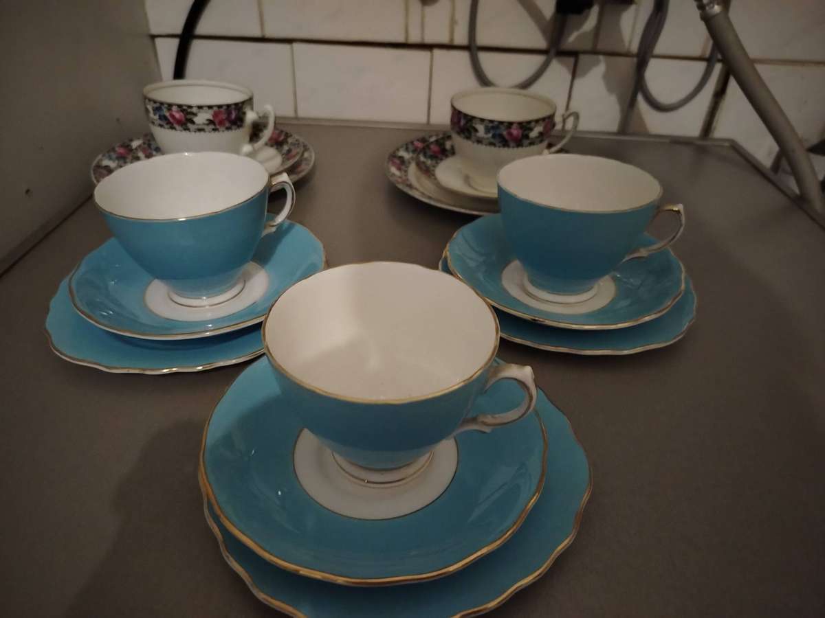Five assorted tea cup trios