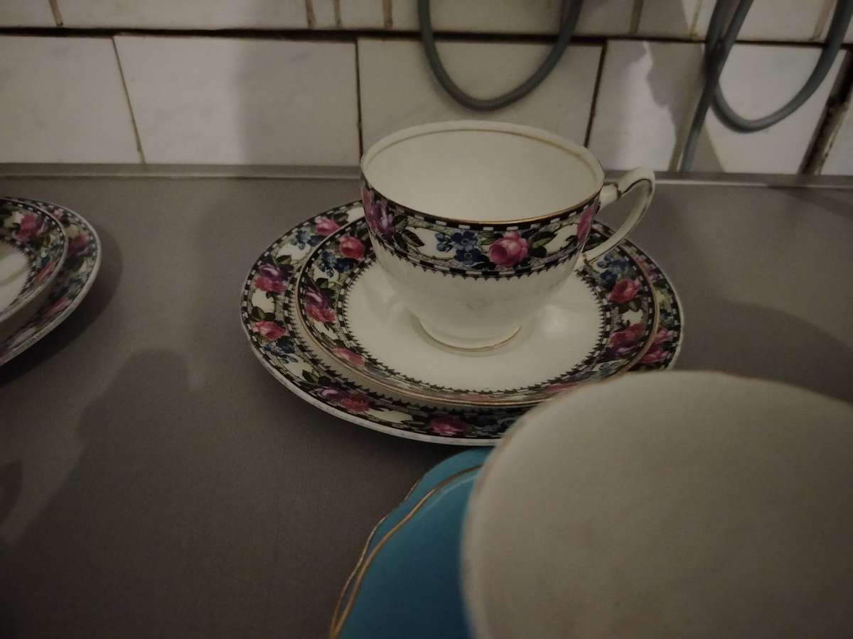 Five assorted tea cup trios