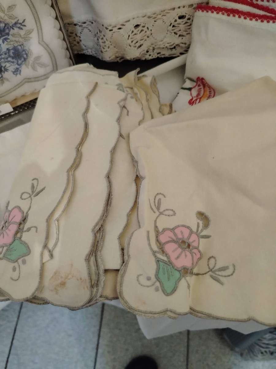 A Wooden storage box with table linen and etc