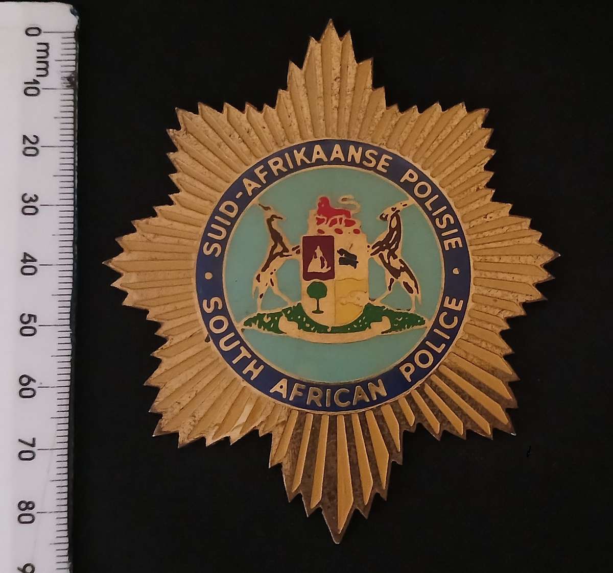 OLD SOUTH AFRICAN POLICE BRASS AND ENAMEL BADGE                       L281
