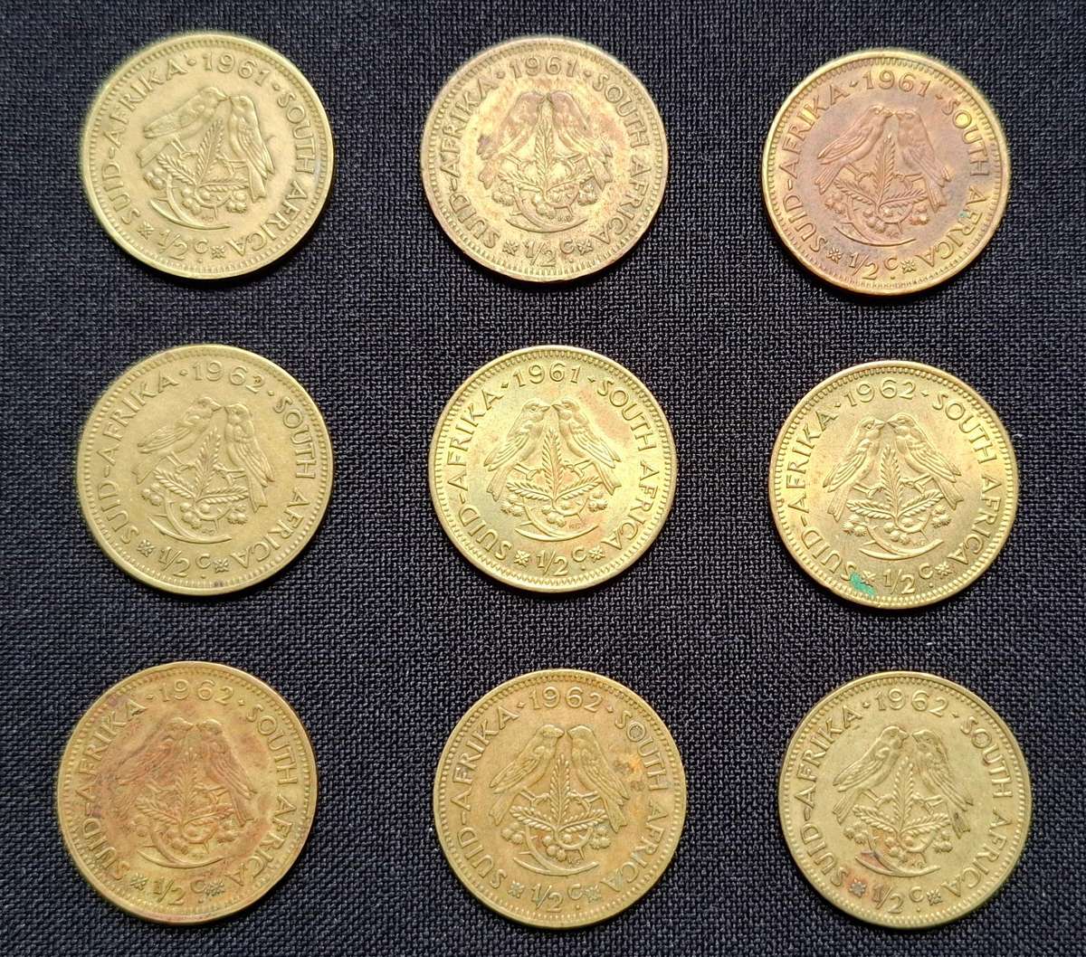 RSA Half Cent Lot ( Fist Decimal )   --- One Bid For The Lot Of 9 Coins                        ( E )