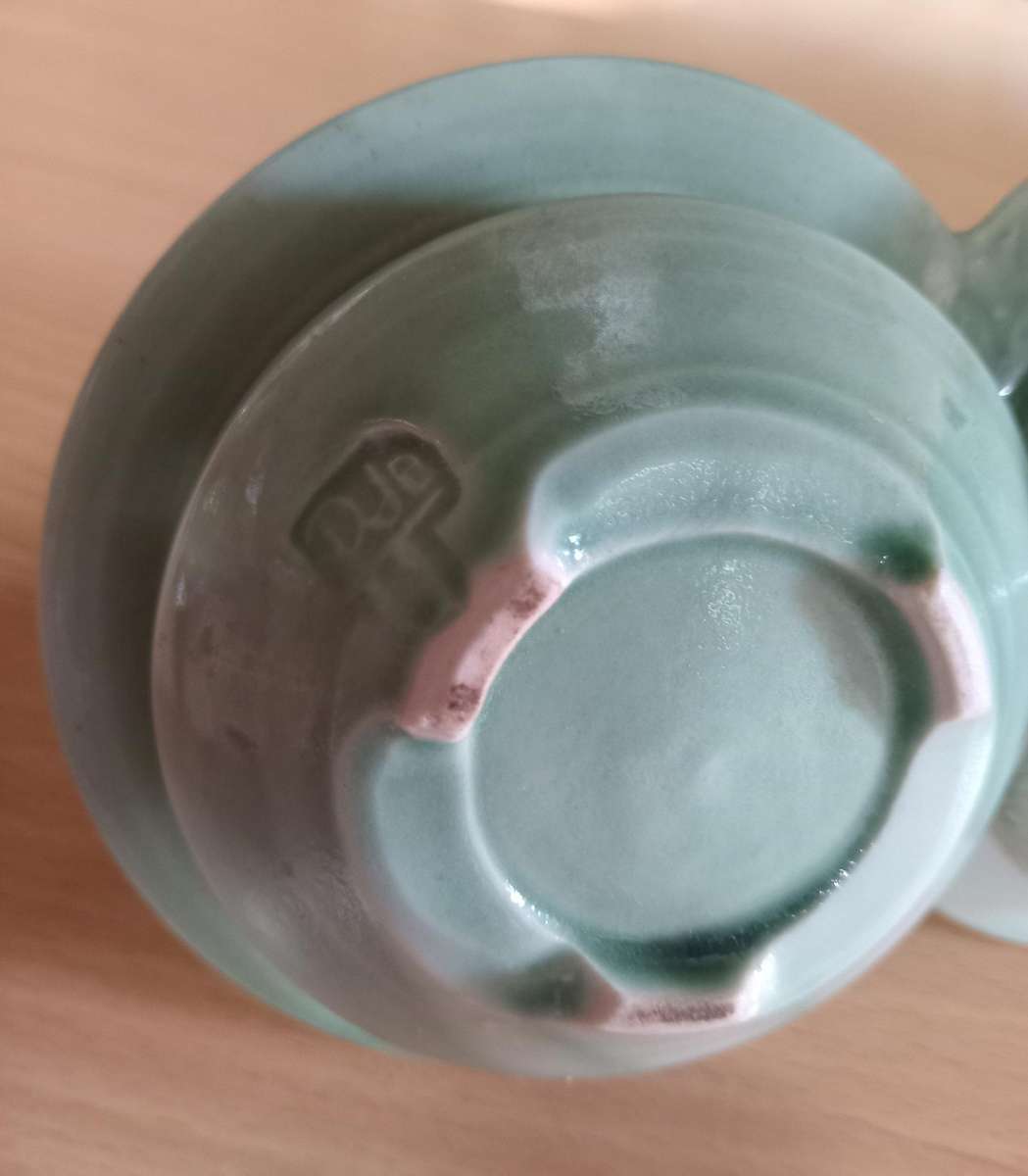 Double compelled pottery