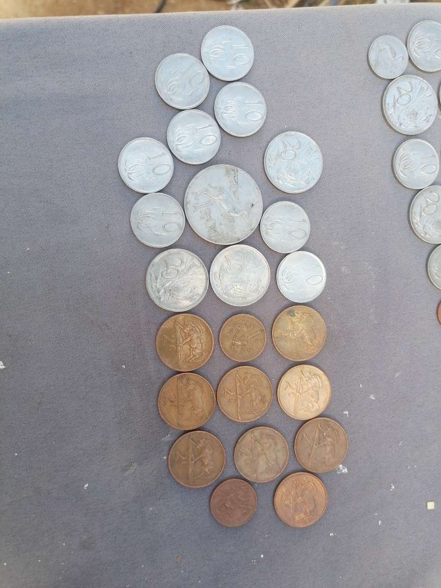 Mix old south african error coins. Bit off centre