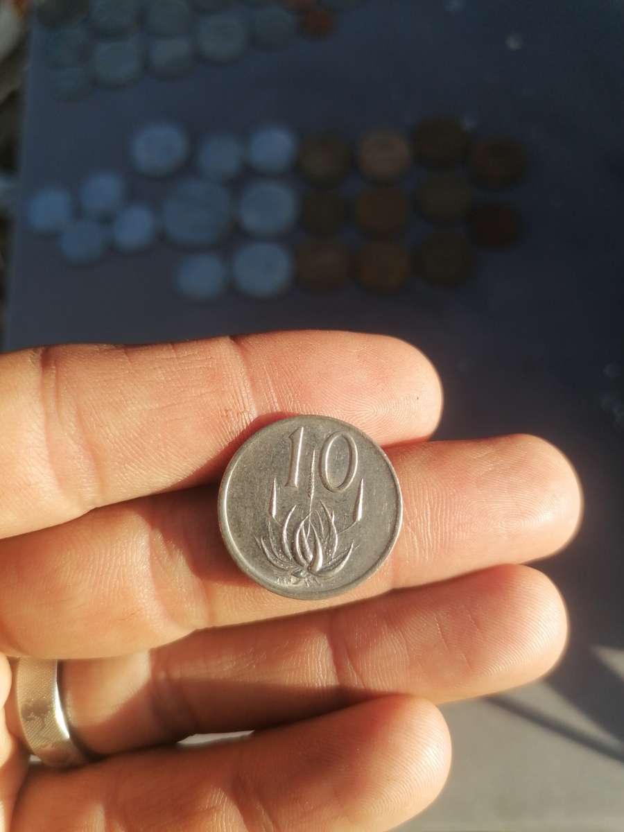 Mix old south african error coins. Bit off centre