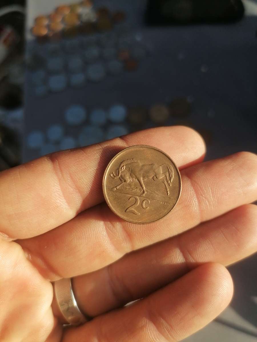 Mix old south african error coins. Bit off centre