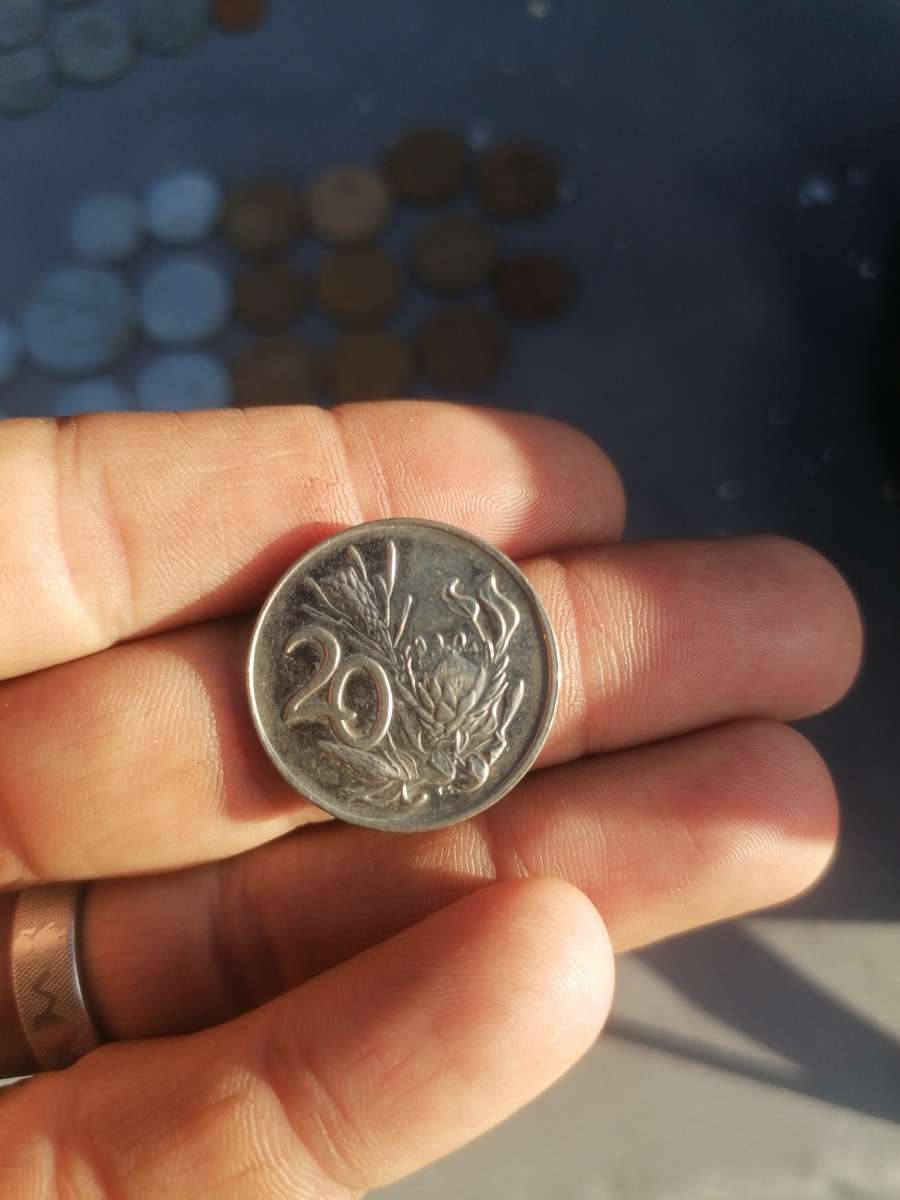 Mix old south african error coins. Bit off centre