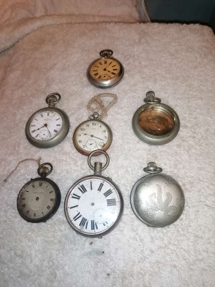 Antique lot of pocket watches and cases. Not working