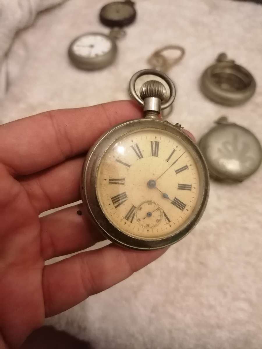 Antique lot of pocket watches and cases. Not working