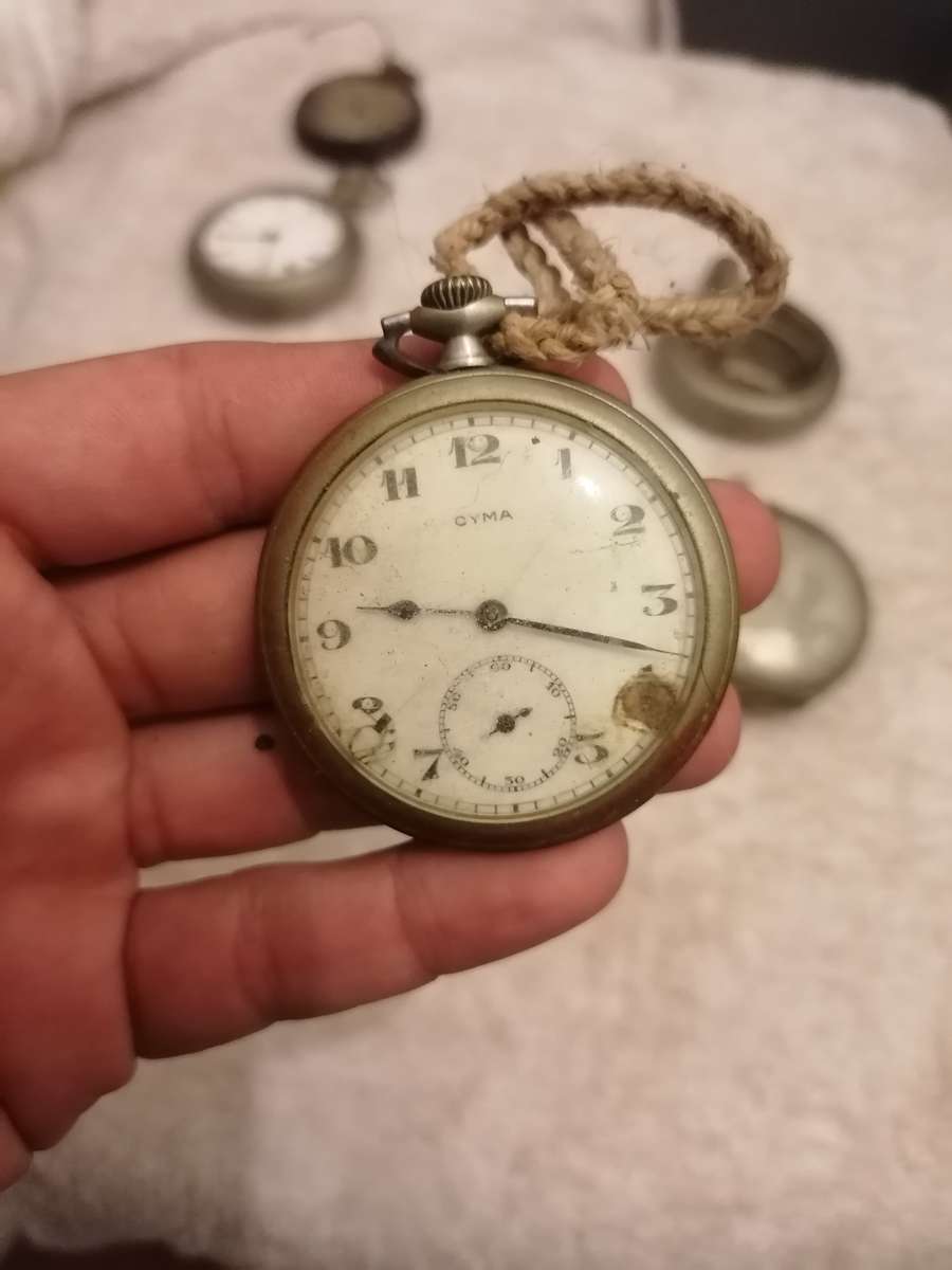 Antique lot of pocket watches and cases. Not working