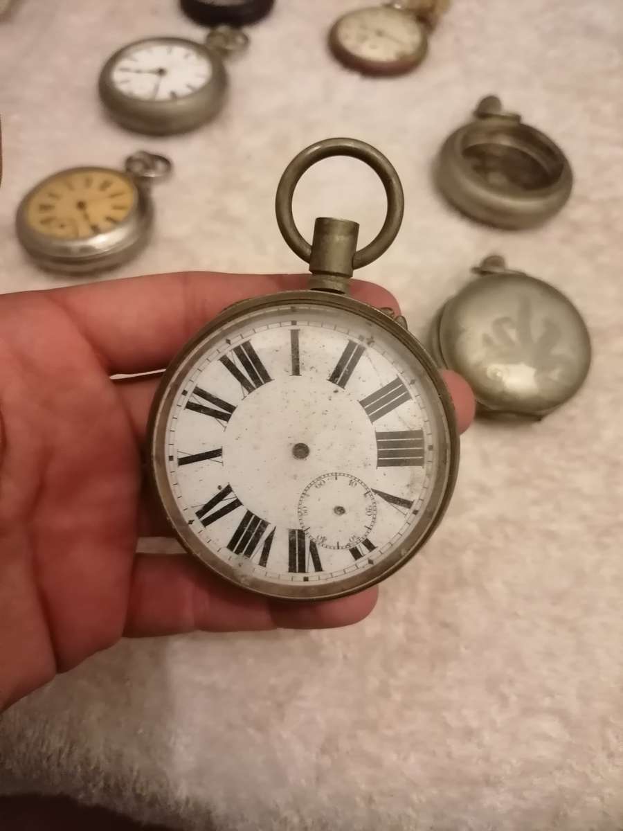 Antique lot of pocket watches and cases. Not working
