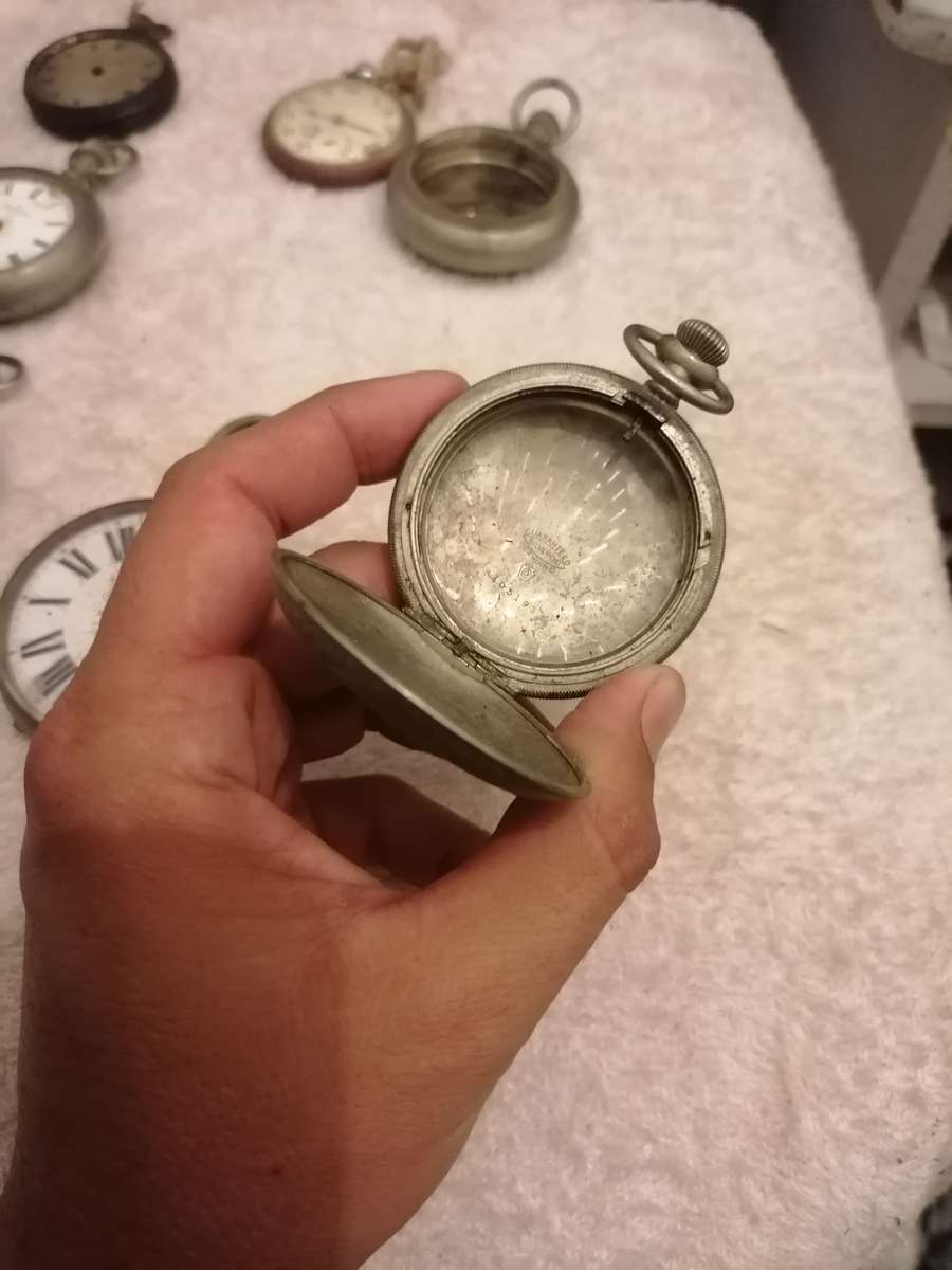 Antique lot of pocket watches and cases. Not working