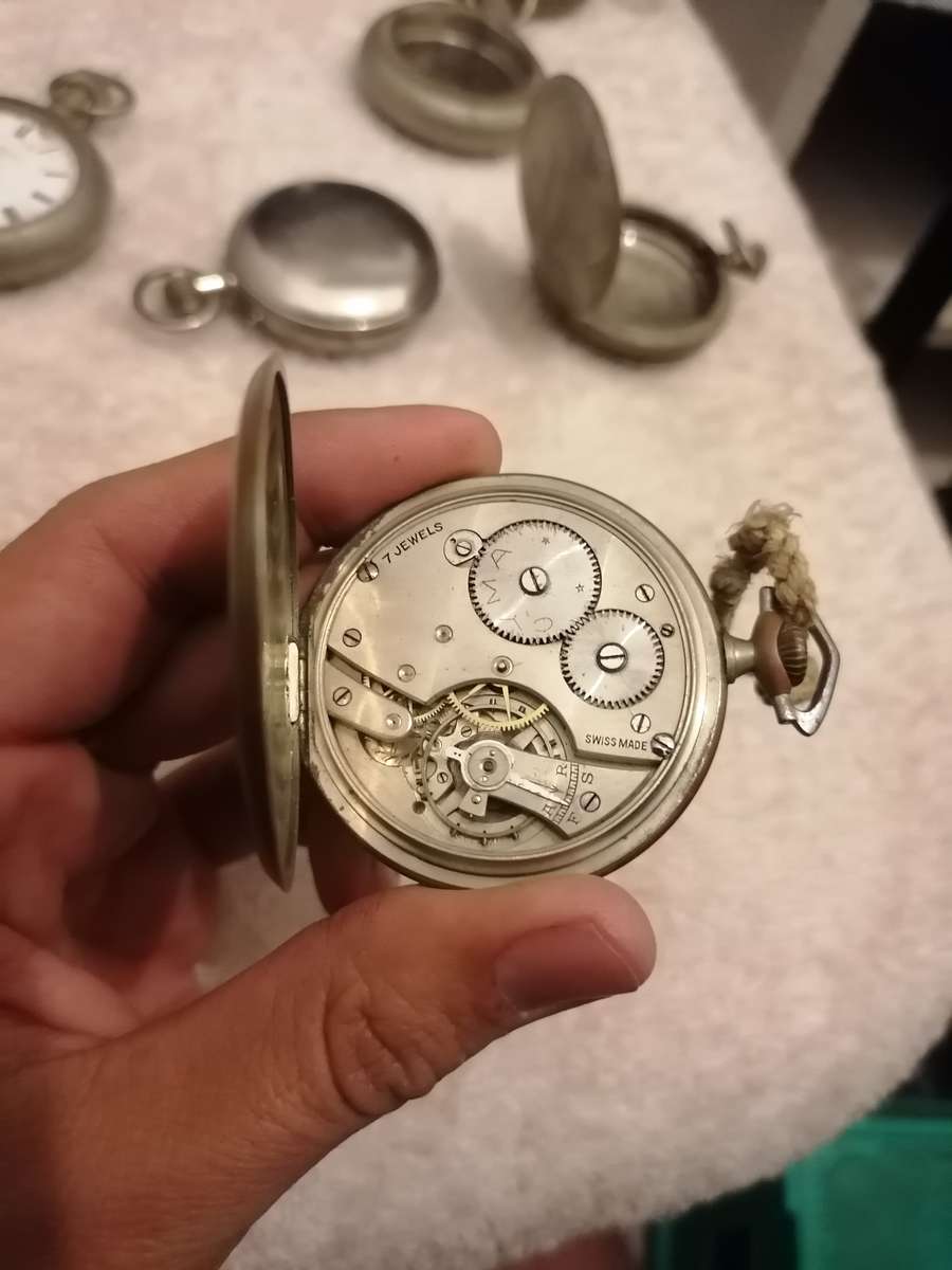 Antique lot of pocket watches and cases. Not working