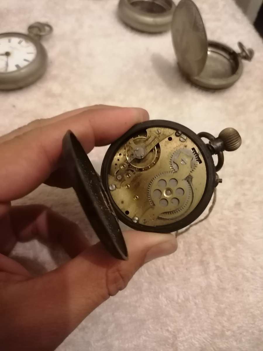 Antique lot of pocket watches and cases. Not working