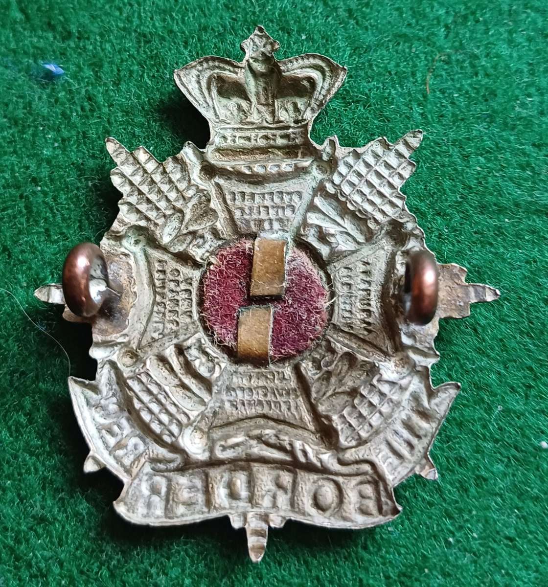 British Army, Border Regt WM Side cap badge, QVC with original backing clips. Height 40mm