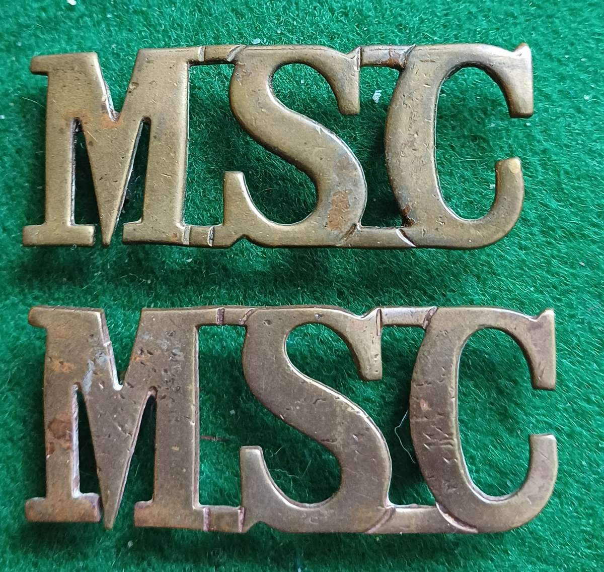 British Army, Medical Service Corps brass titles  pair